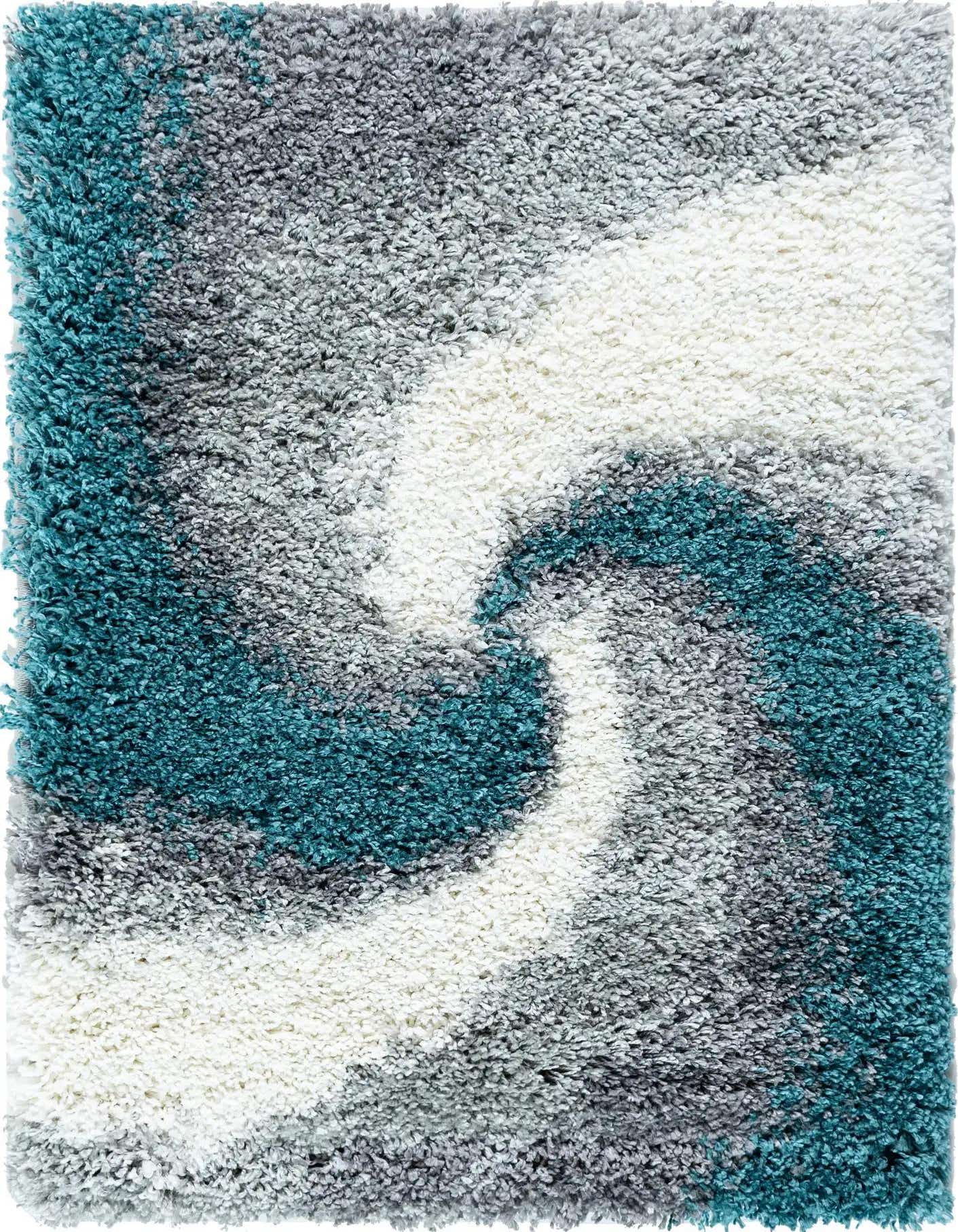 A rectangular 2x3 shag rug with an abstract swirl pattern in shades of blue, grey, and white, showcasing its plush texture.