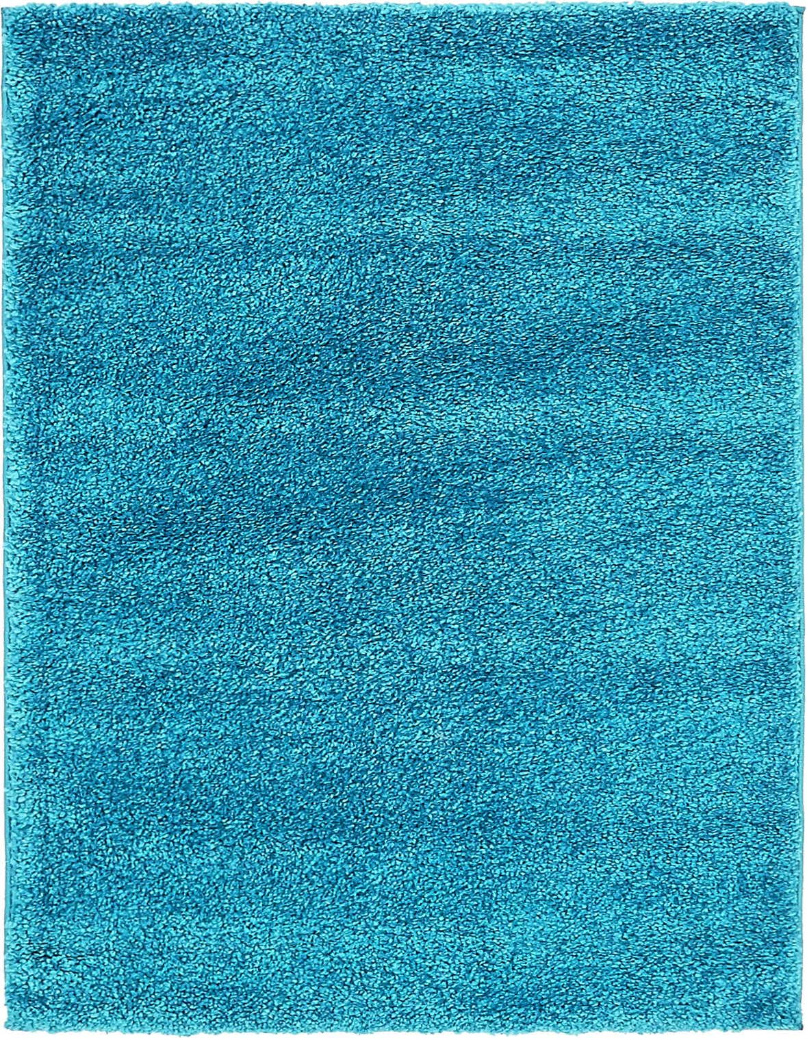 A vibrant 3x5 rectangular blue shag rug with a textured pile, ideal for adding comfort and color to any indoor space.