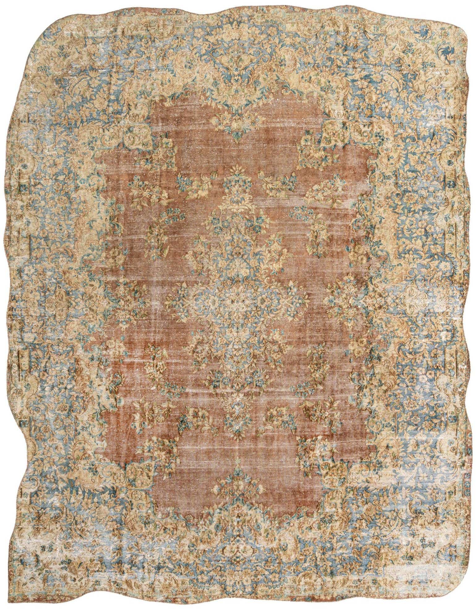 A 9x12 rectangular Vintage Royal Persian rug with a faded blue and brown floral pattern, suitable for a living room.