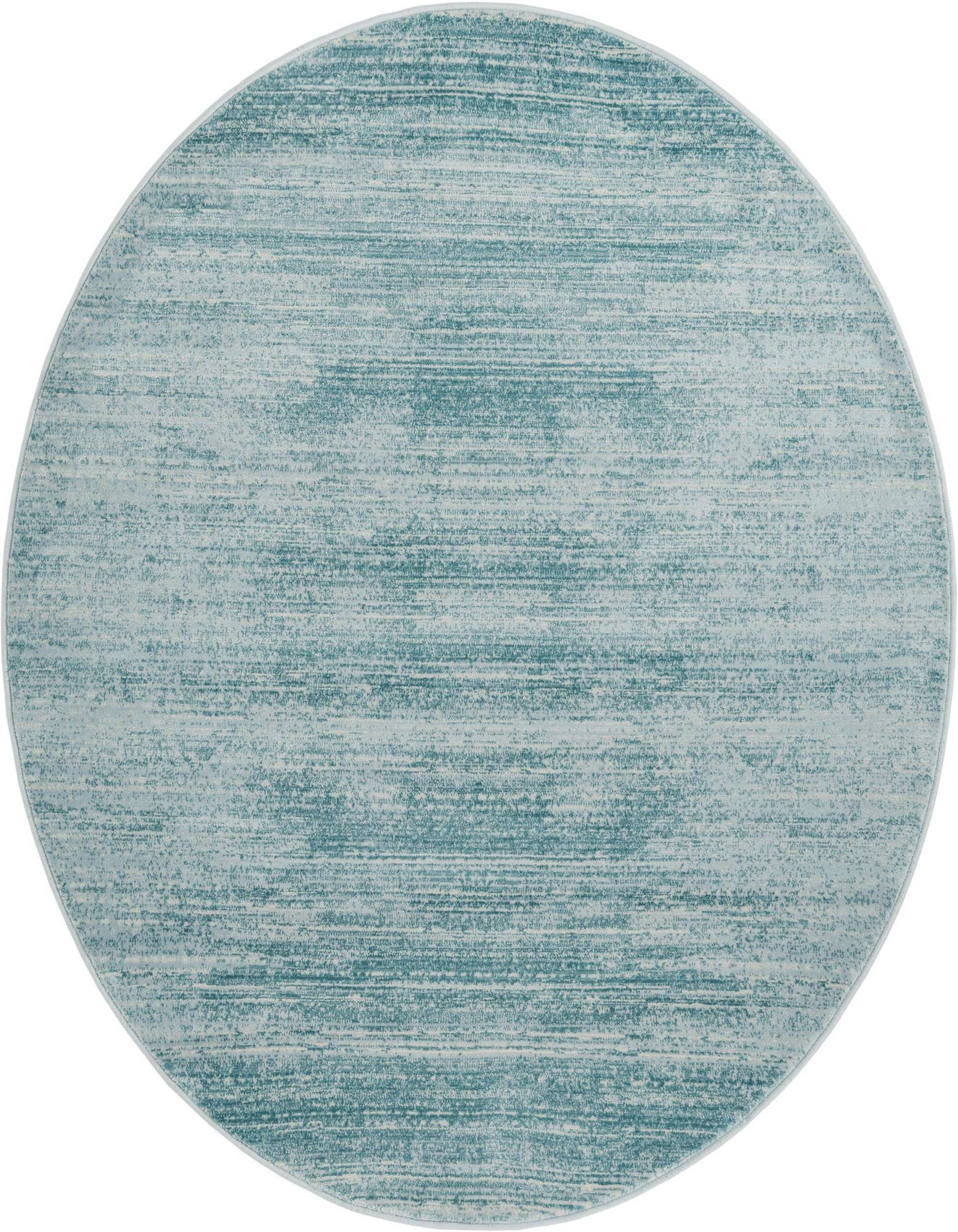 A 5' 3 round blue transitional rug with a textured, mottled pattern of varying blue and white tones.