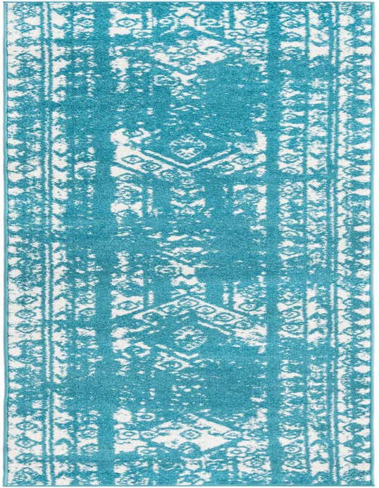 A 10 ft runner rug in shades of blue and white, featuring a distressed Southwestern tribal pattern, perfect for a hallway.