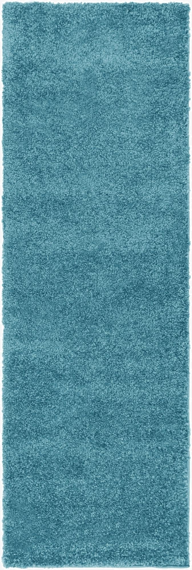 A plush 7 ft runner rug in a solid blue color, featuring a soft shag pile, ideal for a hallway.