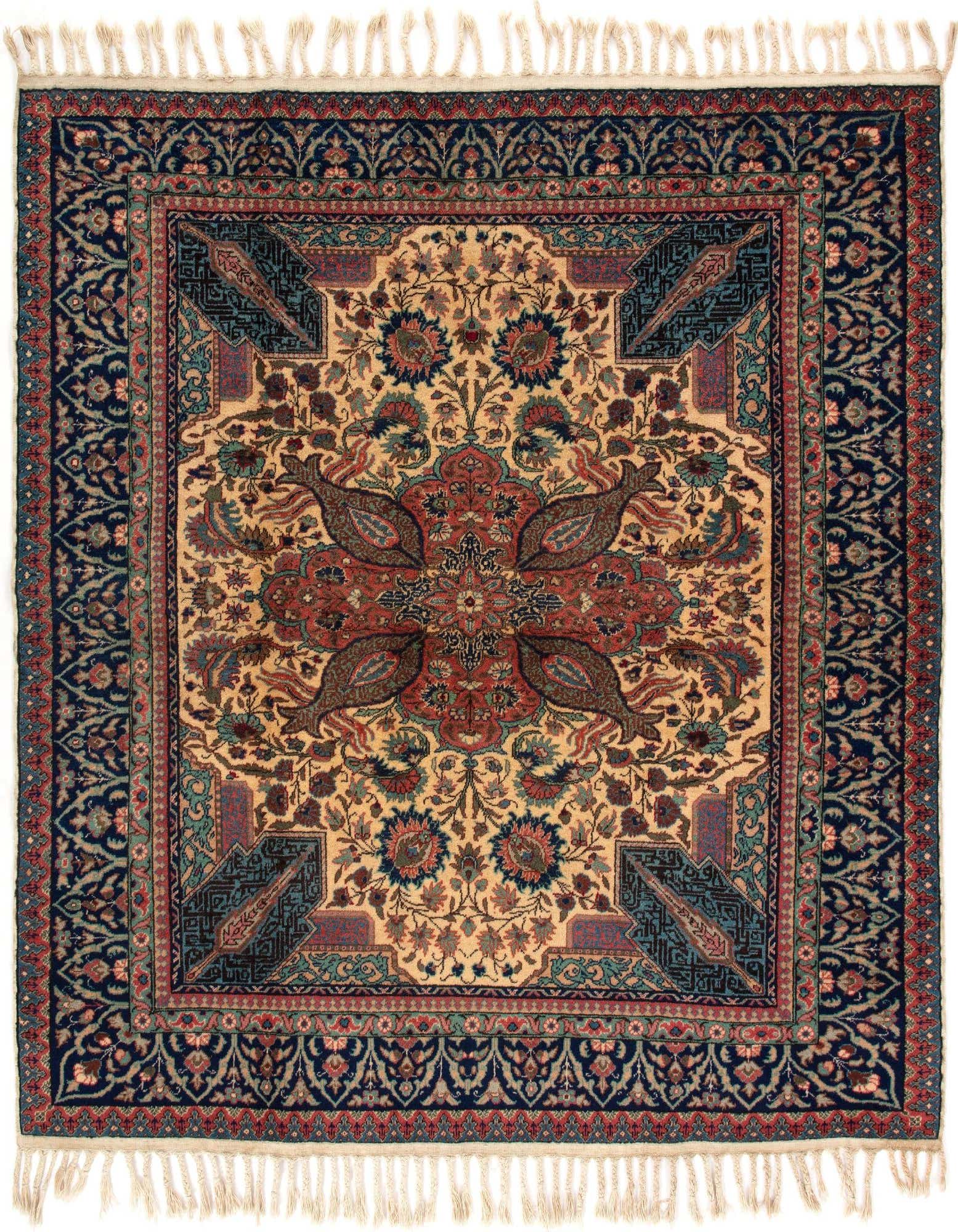 A square 4' 7 x 4' 8 handmade Persian wool rug featuring an intricate floral medallion pattern in blues, reds, and creams.