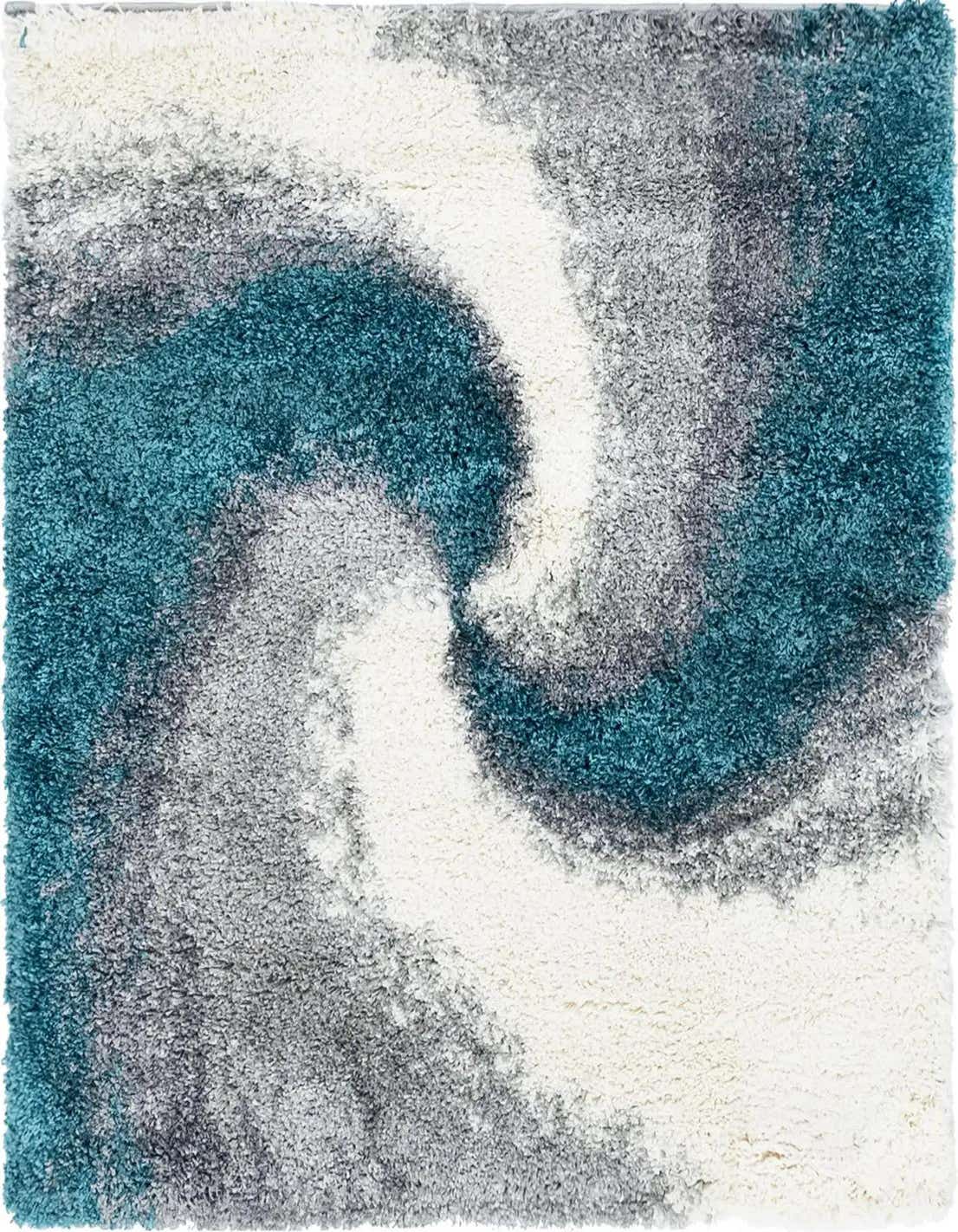 A square blue, grey, and white shag rug with a modern abstract swirl pattern, showcasing its plush texture.