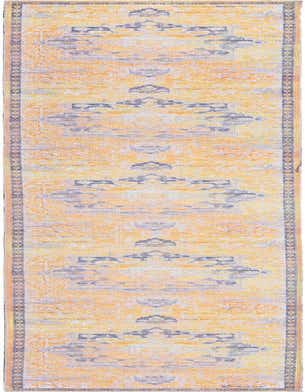 A long 13 ft runner rug in shades of yellow and gold with a distressed traditional medallion pattern, ideal for a hallway.