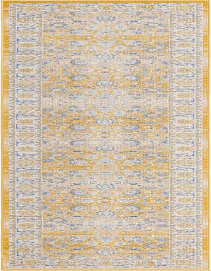 A 12 ft Whitney runner rug in yellow and gold with a traditional botanical and floral pattern, ideal for a hallway.