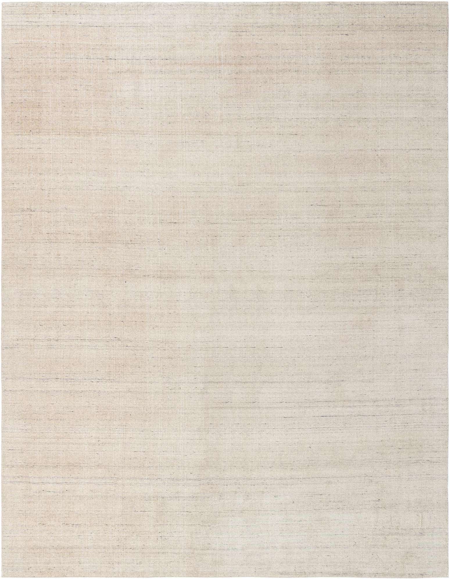 A 10x13 rectangular Jill Zarin English Manor rug in a textured solid ivory and tan wool.