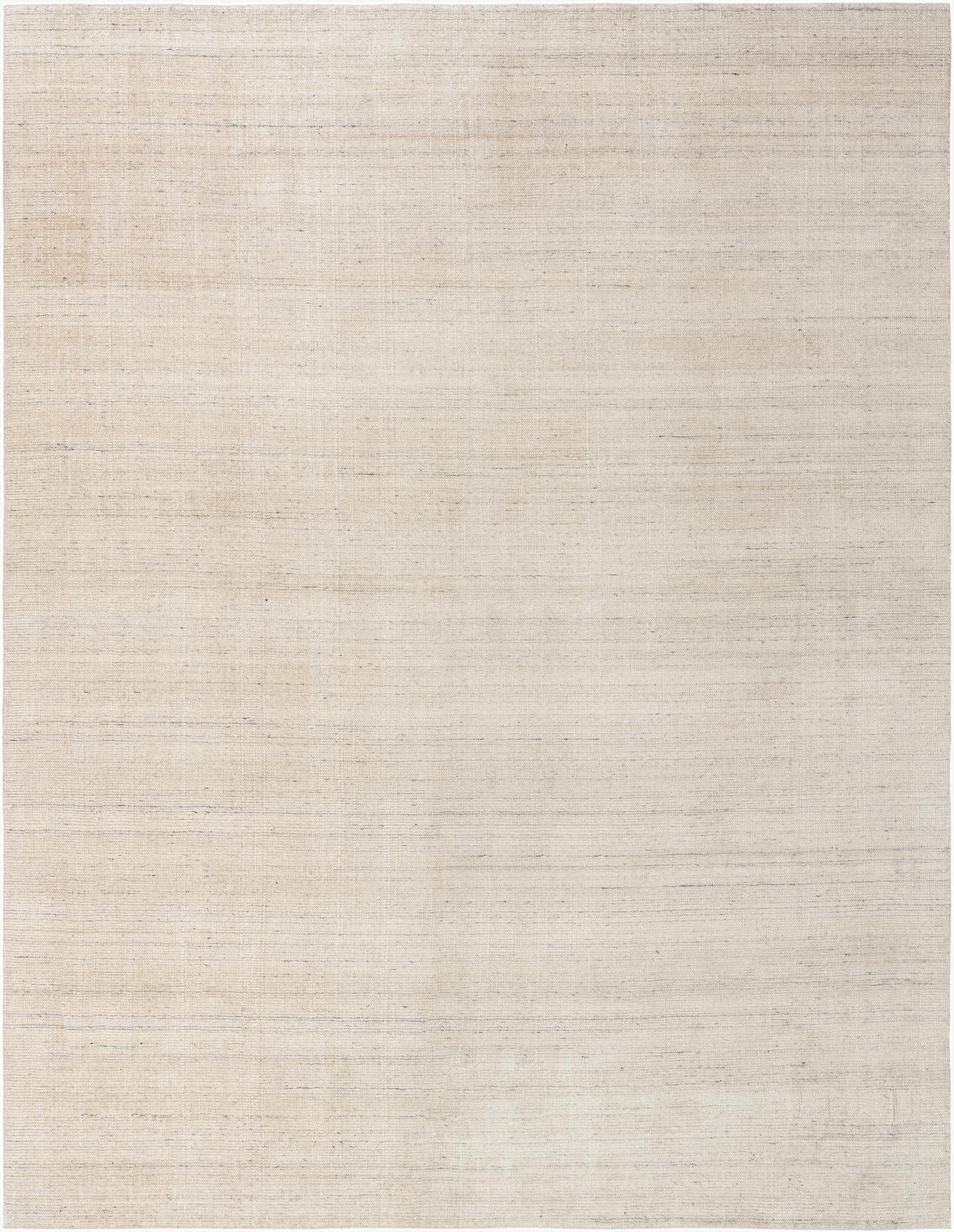 A 10x13 rectangular Jill Zarin English Manor rug in a textured solid ivory and tan wool.