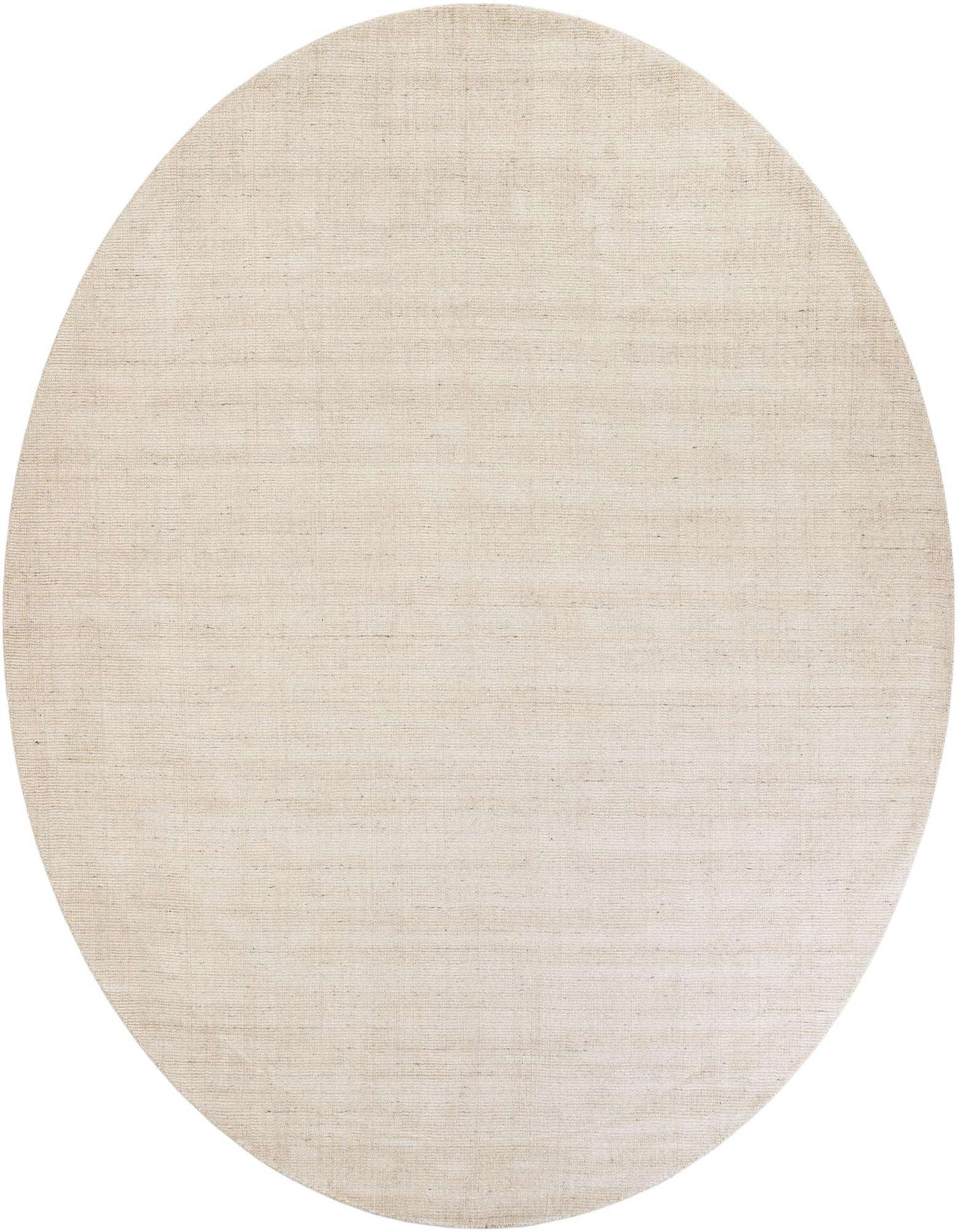 A 12' round Jill Zarin English Manor rug in a light brown, tan, and ivory blend, showcasing its textured wool pile.