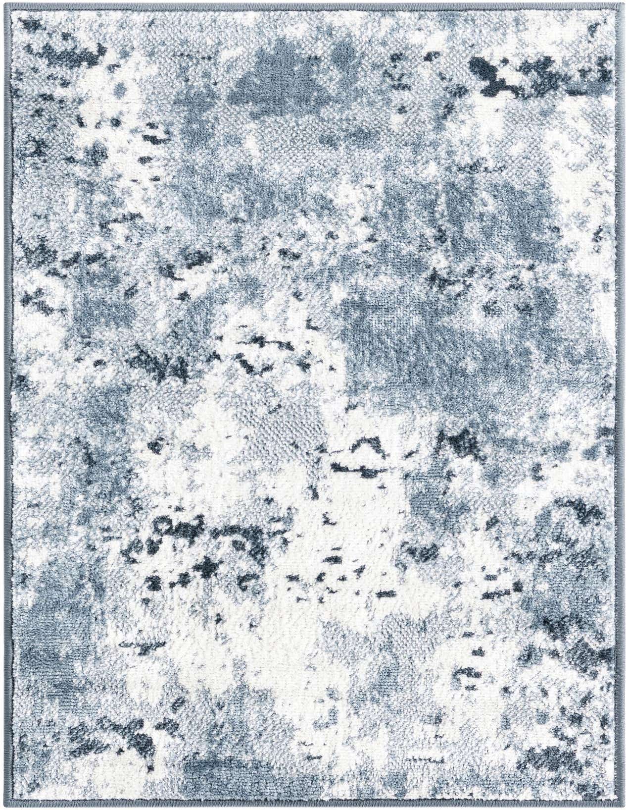 A 2x3 rectangular Aurora collection rug featuring a distressed modern pattern in shades of blue and white.