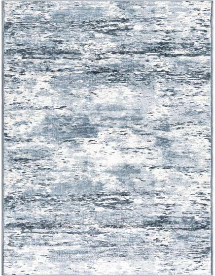 A 12 ft runner rug with a distressed, abstract pattern in varying shades of blue and white, ideal for a hallway.