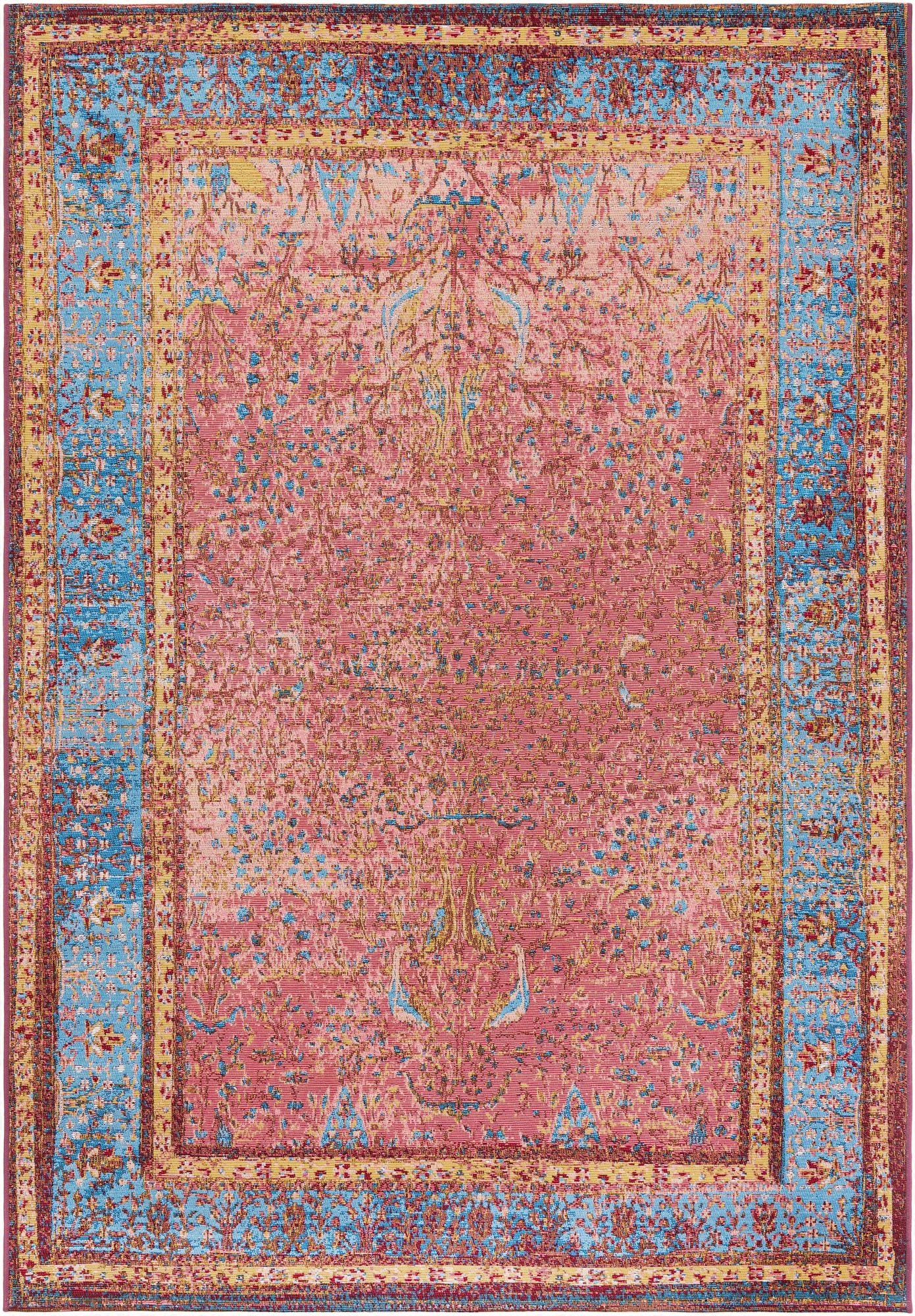 A 5x8 rectangular indoor/outdoor rug featuring a distressed traditional pattern in shades of orange, pink, and light blue.