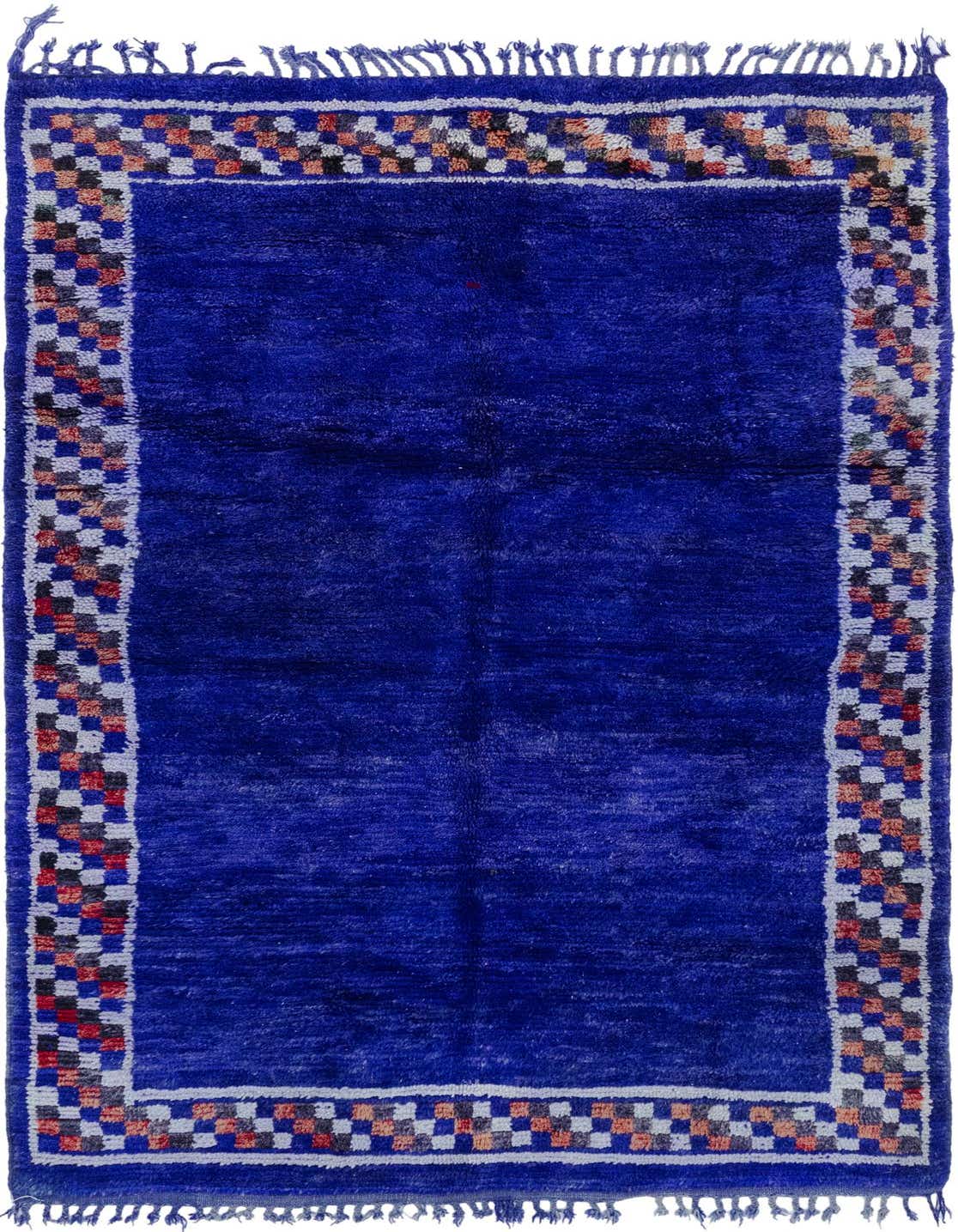 A 5x8 rectangular purple shag rug with a tribal checkered border in white, black, red, and orange.