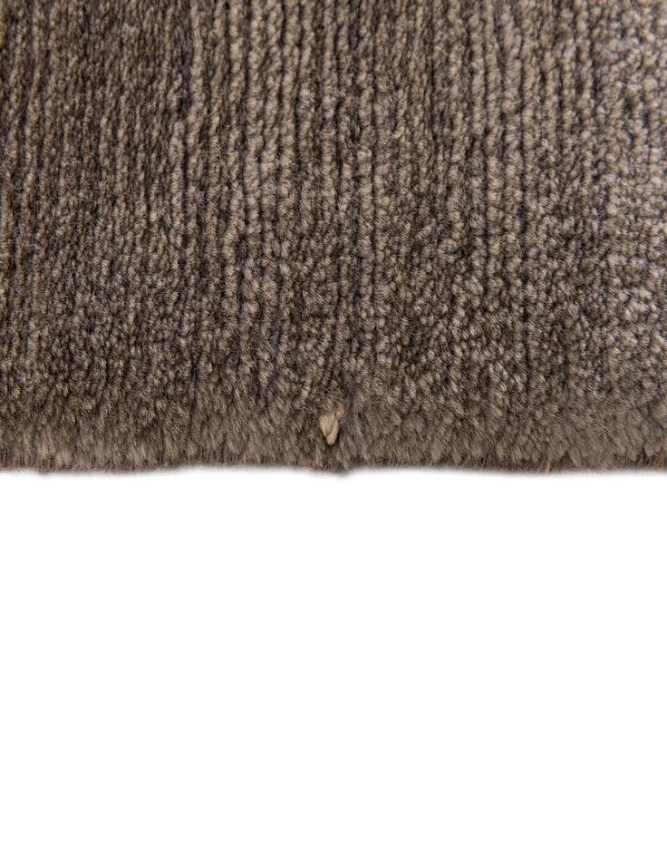 Detail image of  6' 8 x 9' 8  Hand Knotted Tibet Wool Rug