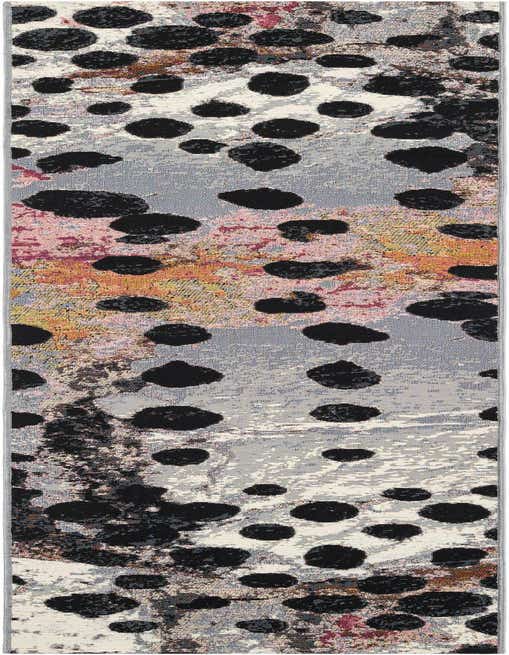 A black, ivory, and cream 8 ft runner rug with a modern abstract pattern of large black spots over a textured, multi-tonal background.