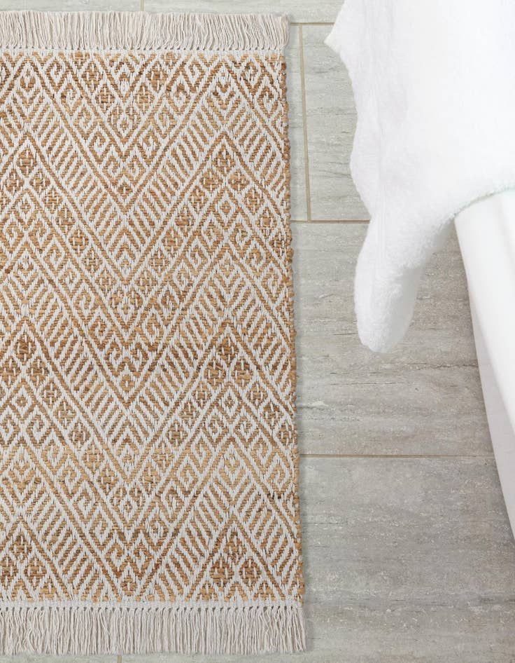 Detail image of  4' 1 x 6' 1  Hand Braided Jute Rug