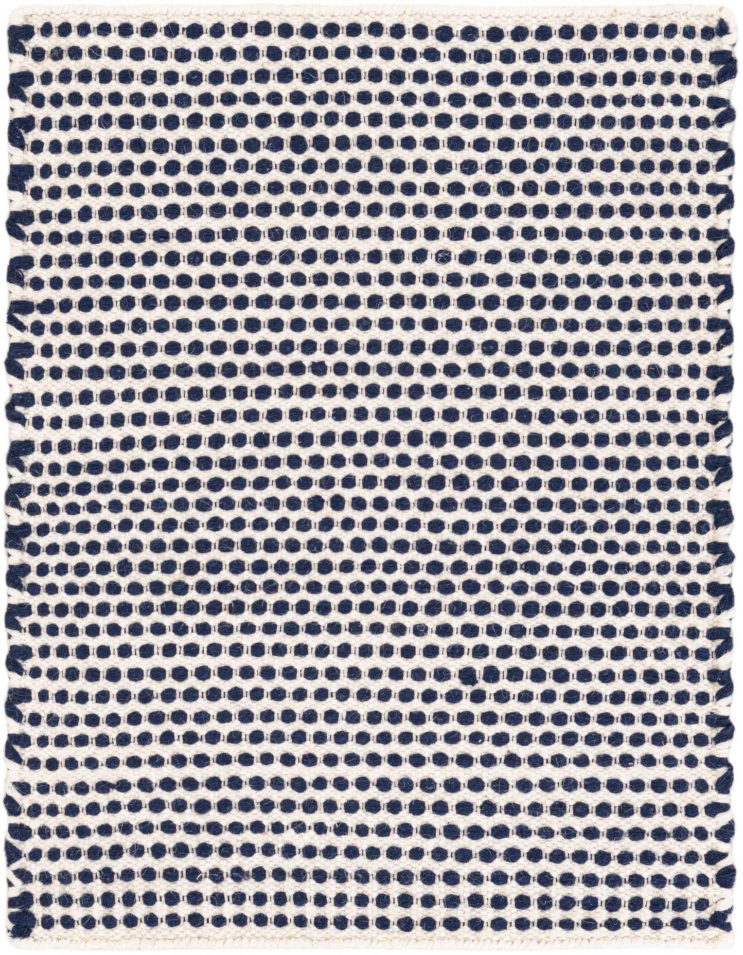 A 2x3 rectangular Rugs.com Seaside Pearl Jute rug with a modern abstract pattern of navy blue dots on a white background.