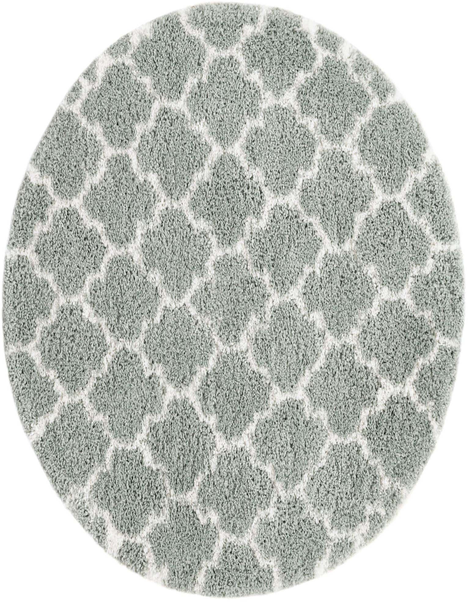 A 5' 3 round white and cyan shag rug with a modern abstract pattern, perfect for an indoor living space.