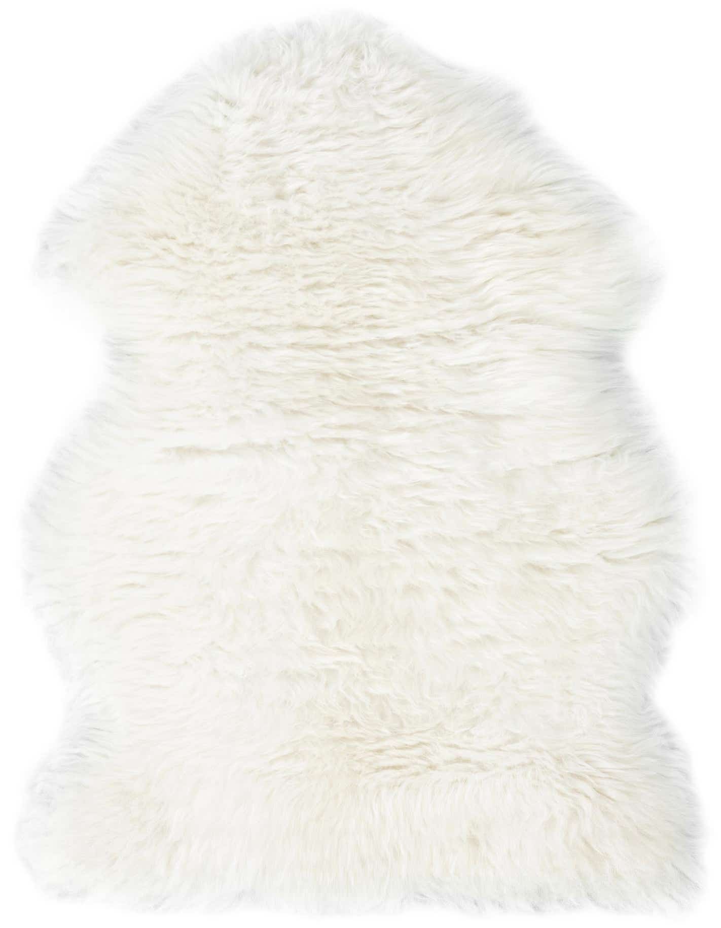 A plush, soft white 1' 10 x 3' 0 freeform lambskin rug with a textured pile, ideal for adding warmth to any indoor space.