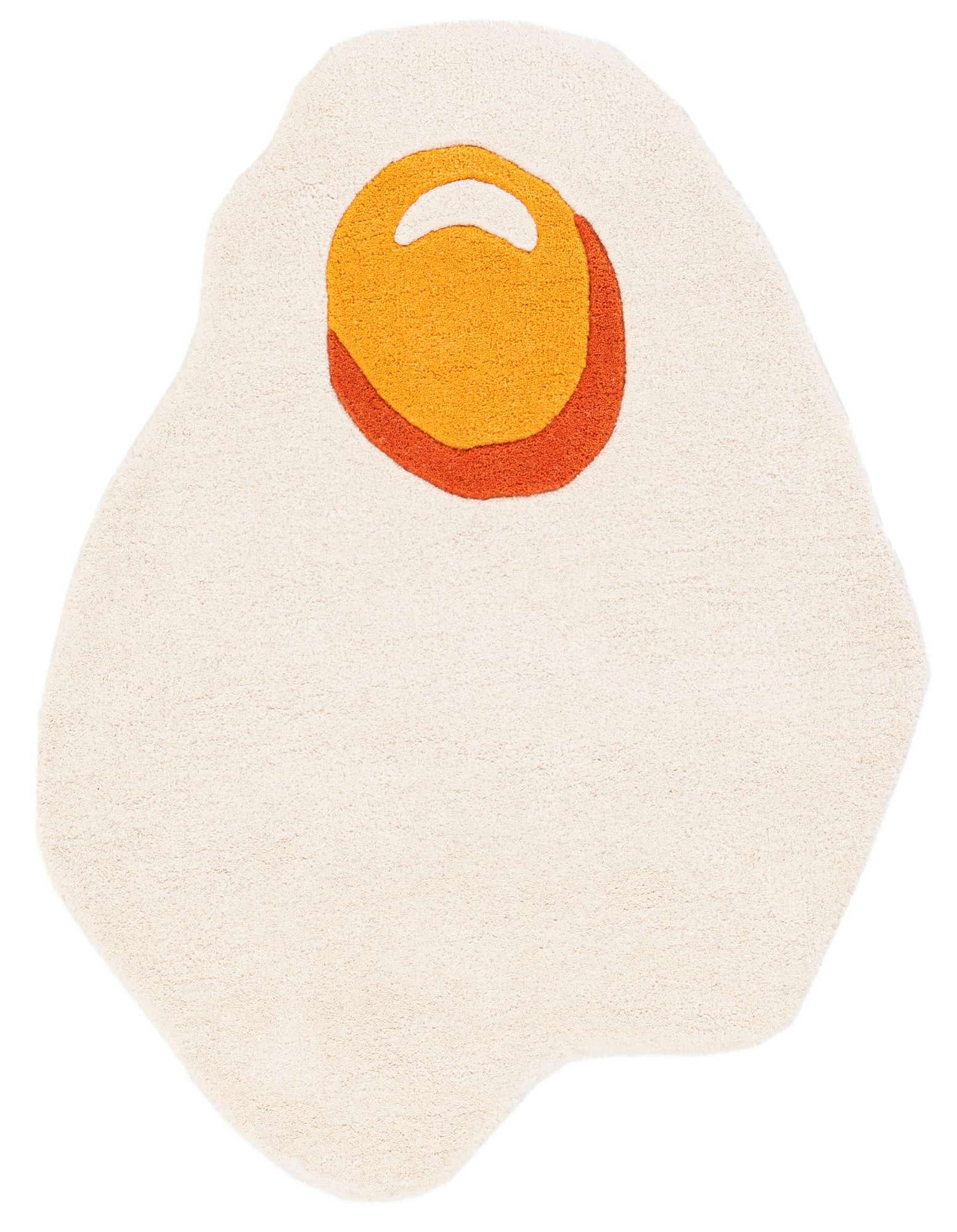 A whimsical 3'1" x 3'1" freeform rug shaped like a fried egg, with a white 'egg white' and a vibrant orange and yellow 'yolk' design.