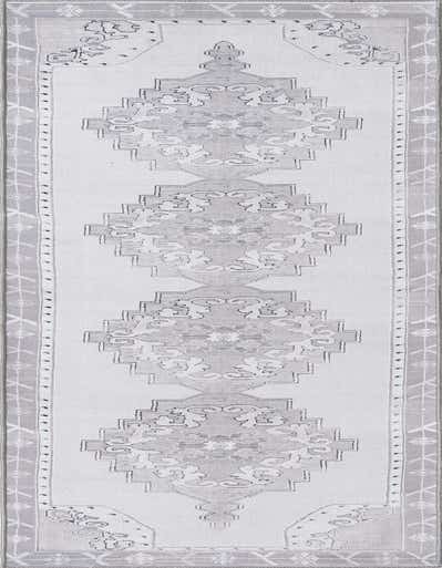 A 12 ft runner rug in white and gray with a vintage oriental medallion pattern, ideal for a hallway.