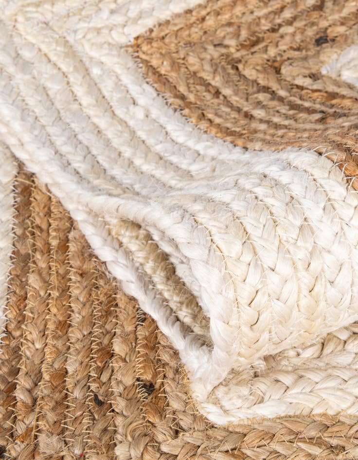 Detail image of  4' 1 x 6' 1  Hand Braided Jute Rug