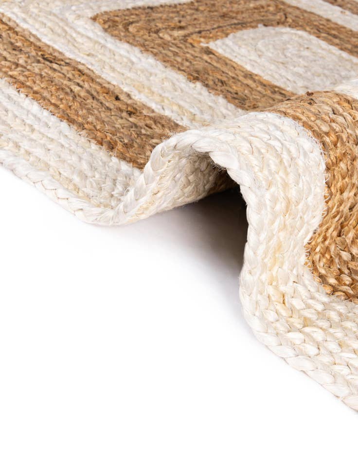 Detail image of  4' 1 x 6' 1  Hand Braided Jute Rug