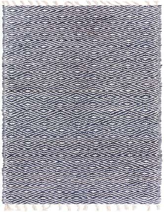 A 12 ft runner rug featuring a repeating diamond pattern in white and navy blue, with fringed ends.