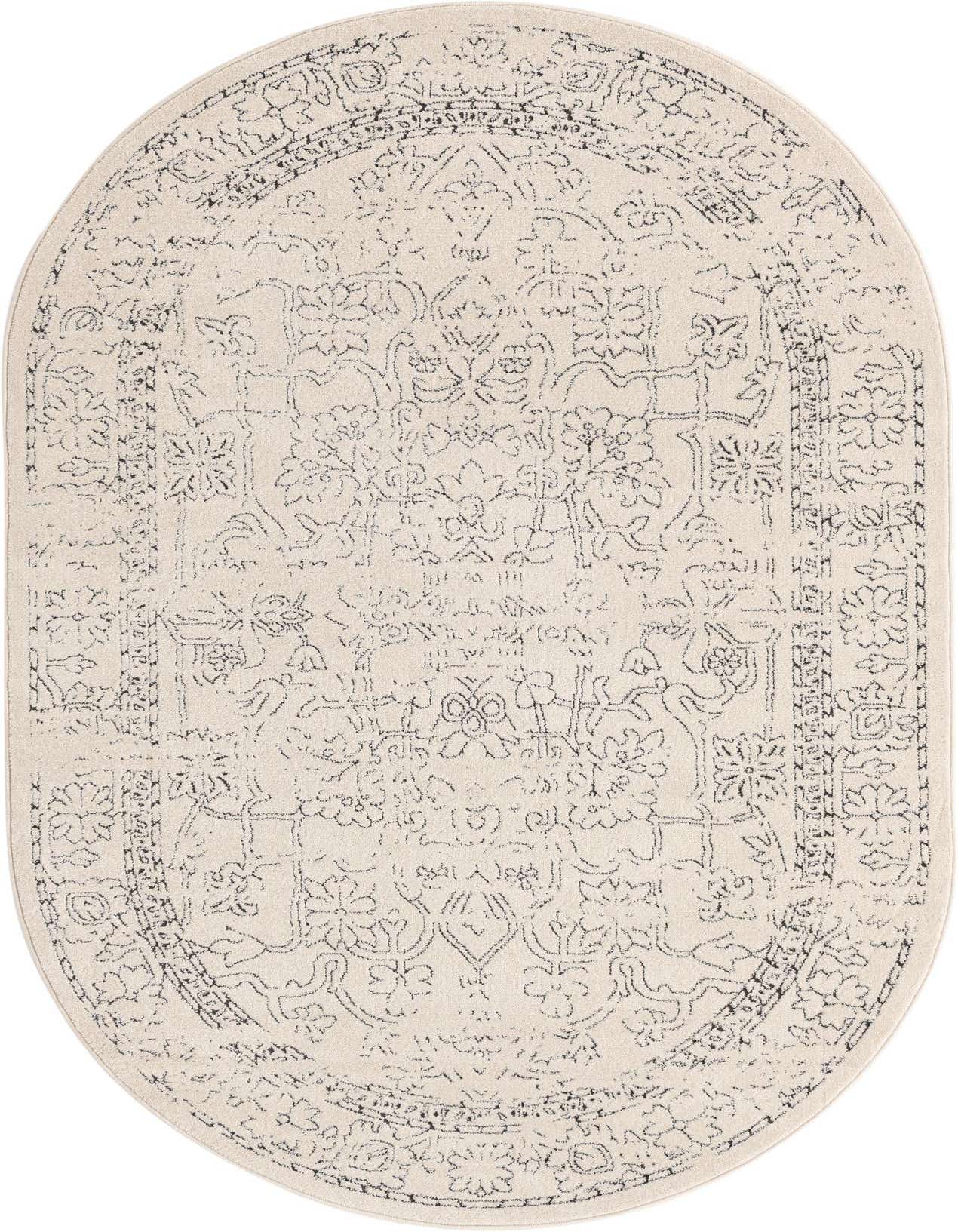 An oval 5'x8' white rug with a distressed black traditional medallion and floral pattern, featuring a textured high/low pile.