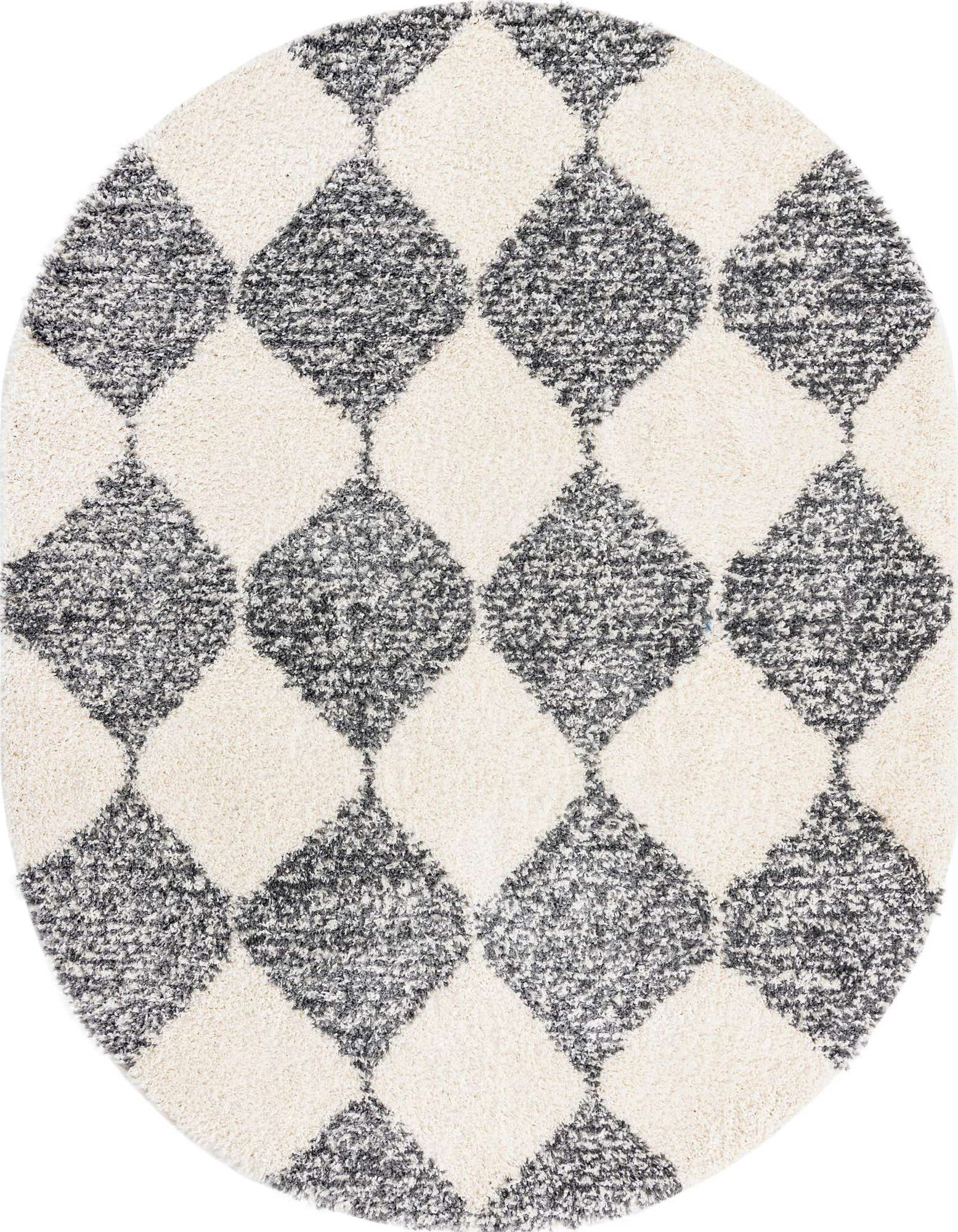 An oval Serenity Shag rug with a modern trellis pattern in white and dark gray, featuring a plush, textured pile.