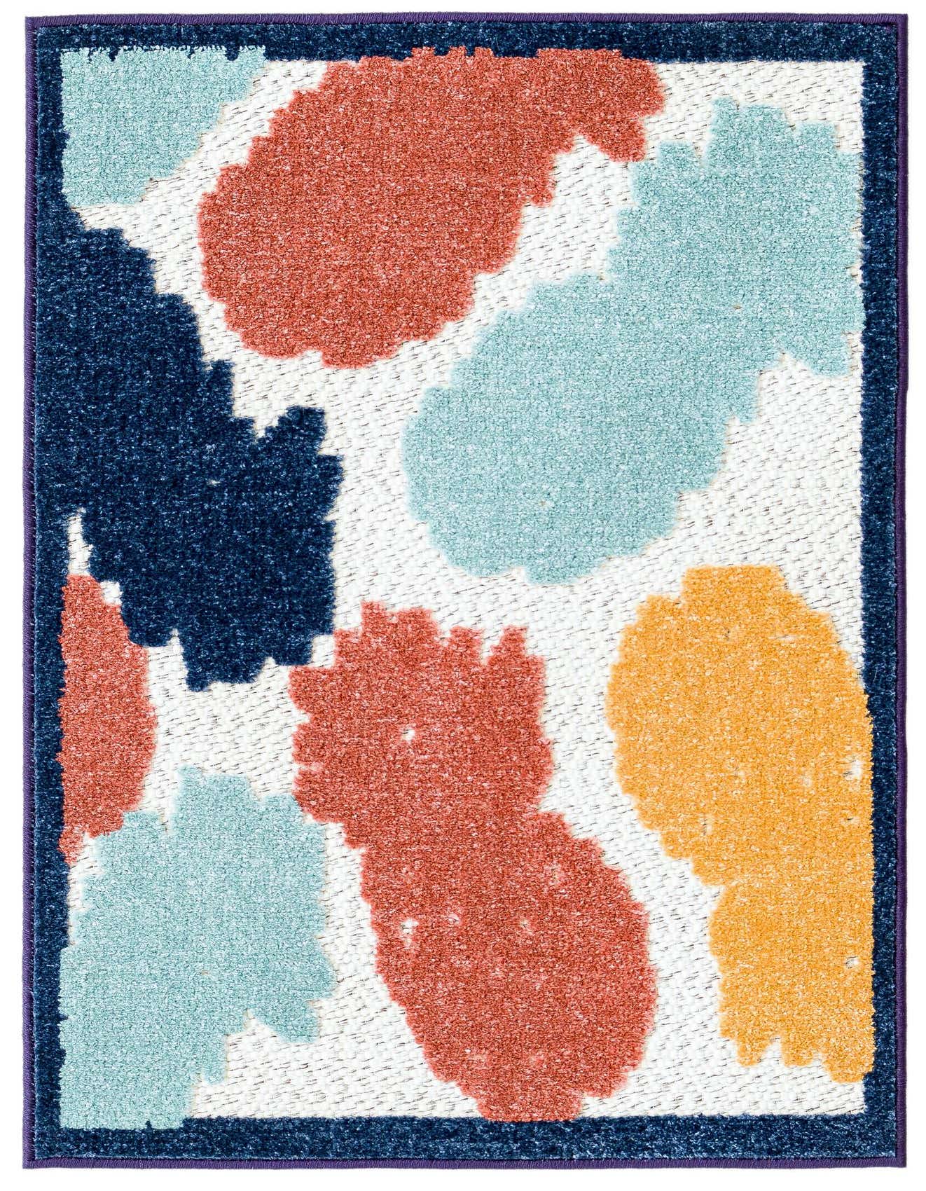 A 2x3 rectangular indoor/outdoor rug with a modern abstract pattern in white, navy, coral, light blue, and gold.