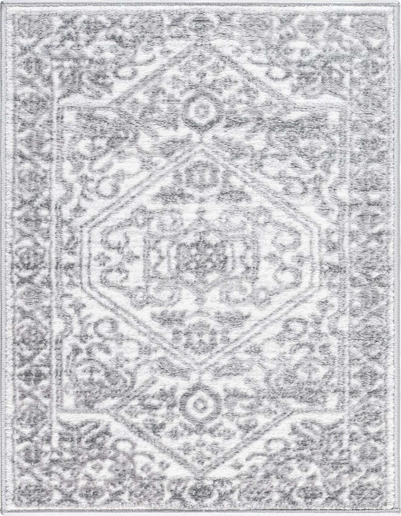 A 2x3 rectangular white area rug with a subtle gray traditional medallion pattern and textured pile.