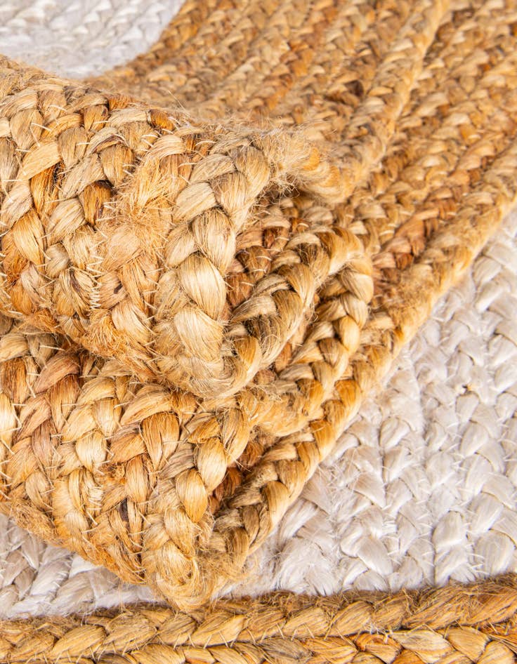 Detail image of  6' 1 x 9'  Hand Braided Jute Rug