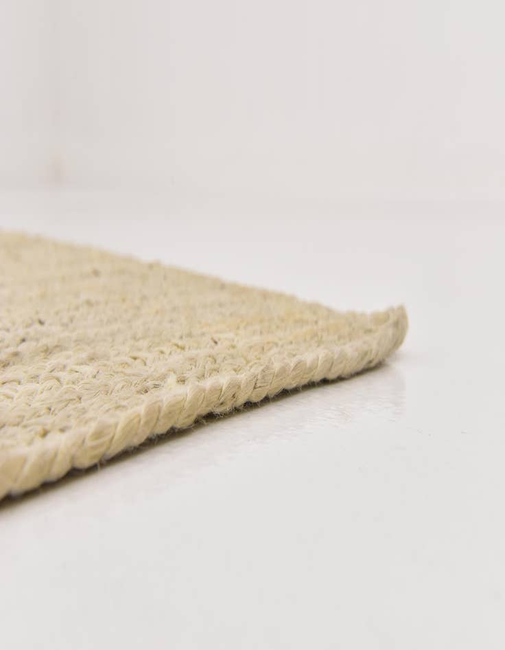 Detail image of  5' 1 x 8'  Hand Braided Jute Rug