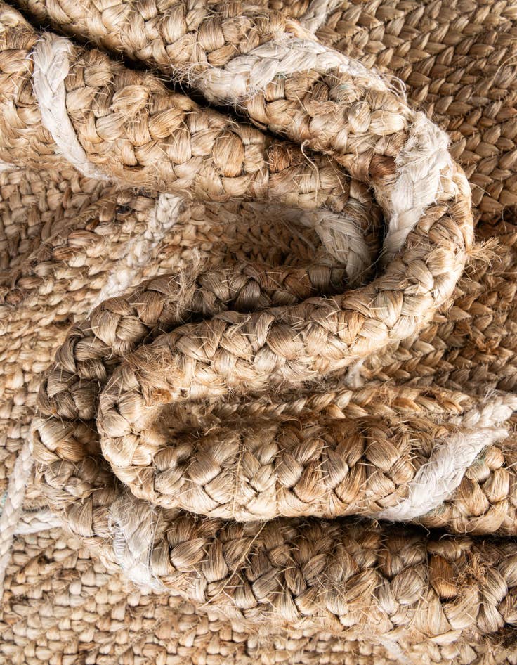 Detail image of  6' 1 x 9'  Hand Braided Jute Rug