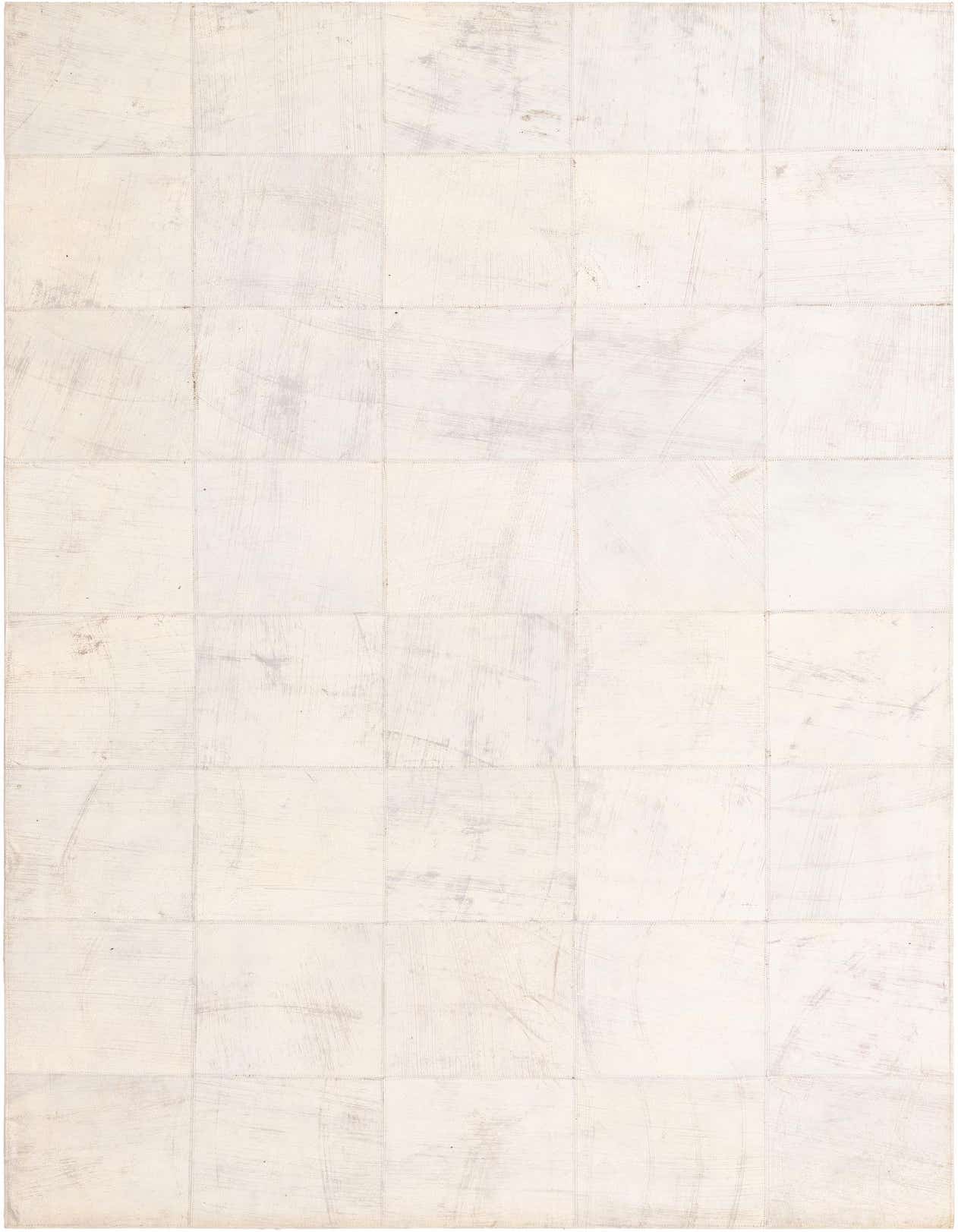 A 5x8 rectangular white cowhide and leather rug with a modern patchwork pattern, ideal for a living room.