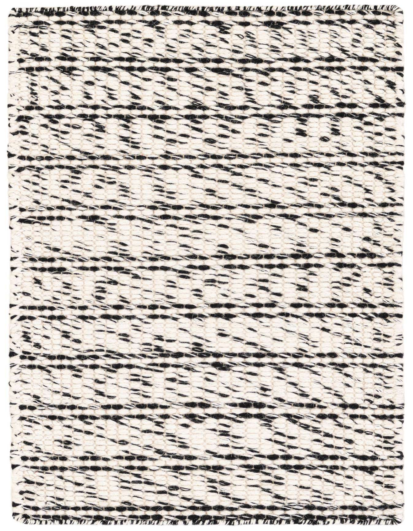 A 2x3 rectangular Rugs.com Seaside Pearl Jute rug with a modern abstract pattern in white and black.