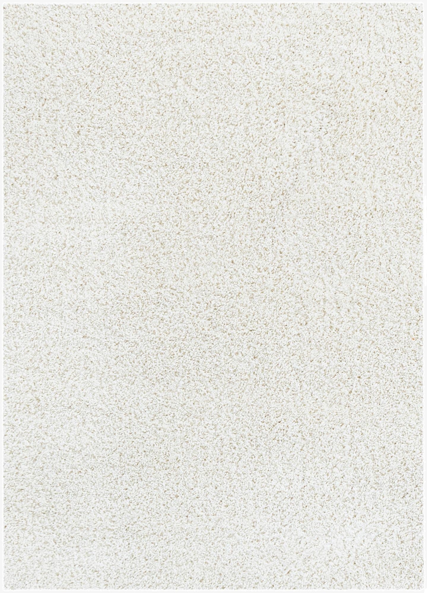 A close-up view of an 8x11 rectangular white shag rug, showcasing its soft, textured pile.