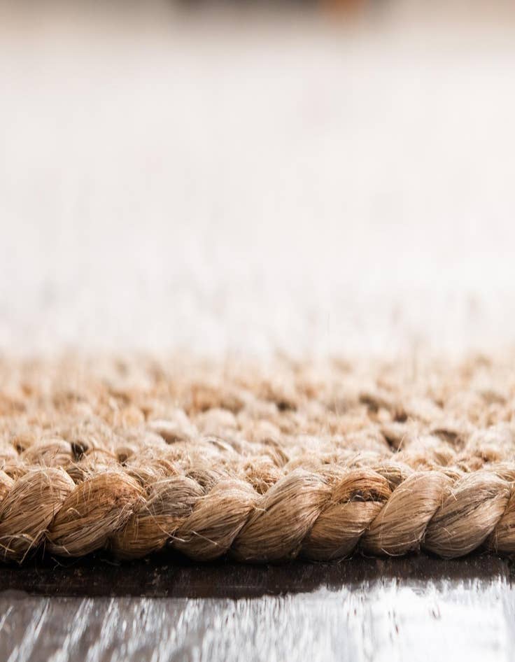 Detail image of  3' 3 x 3' 3  Hand Braided Jute Round Rug
