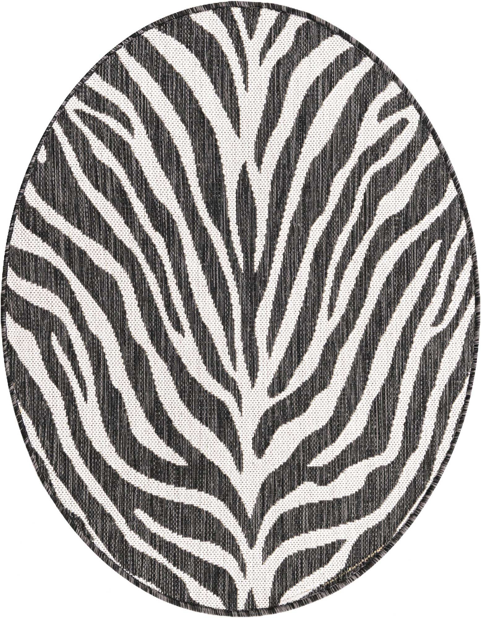 A 3' round white and black zebra print rug from the Outdoor Safari collection, suitable for indoor or outdoor use.