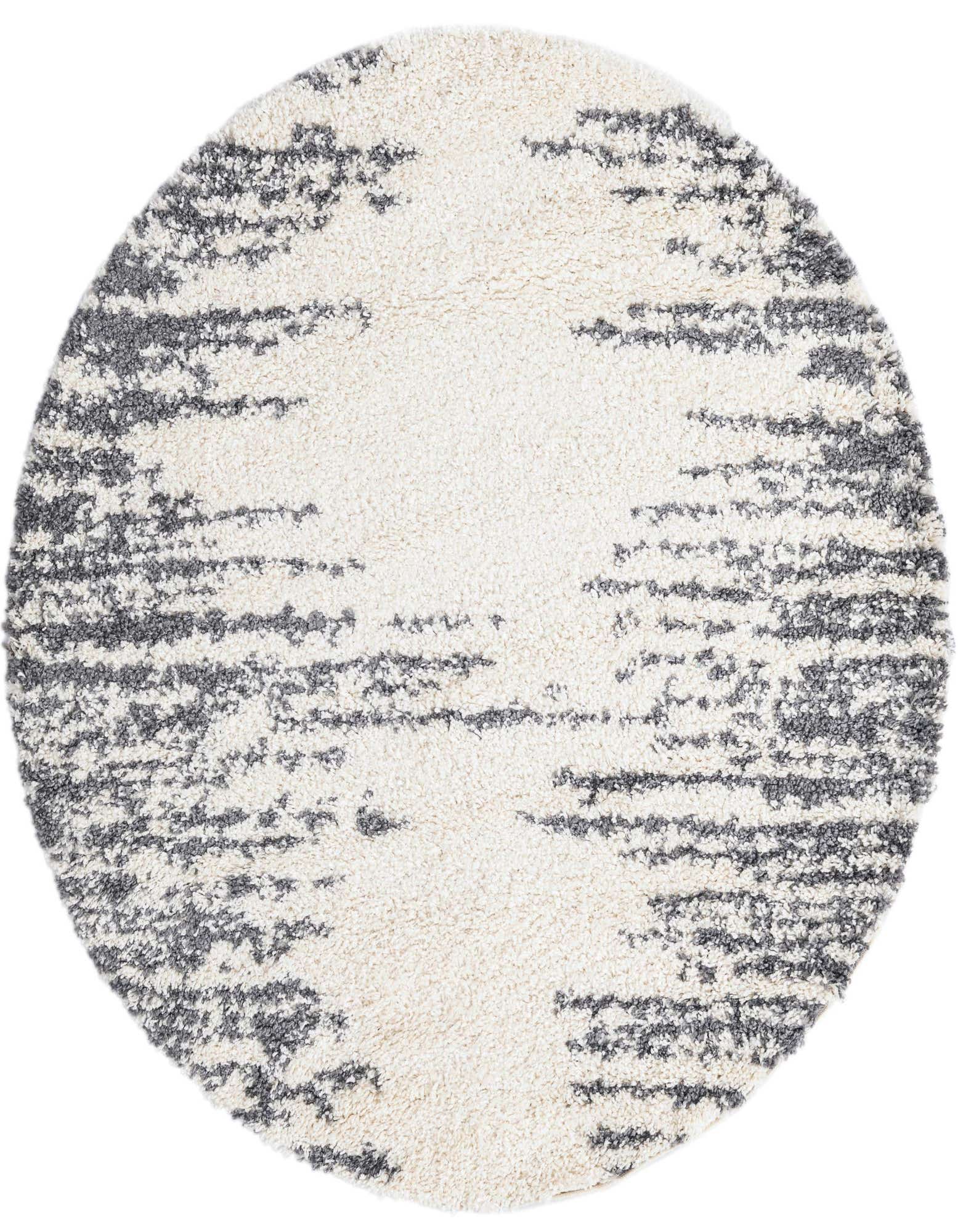 A round 5' 3" white shag rug with a modern, abstract gray pattern resembling horizontal brushstrokes, suitable for indoor spaces.