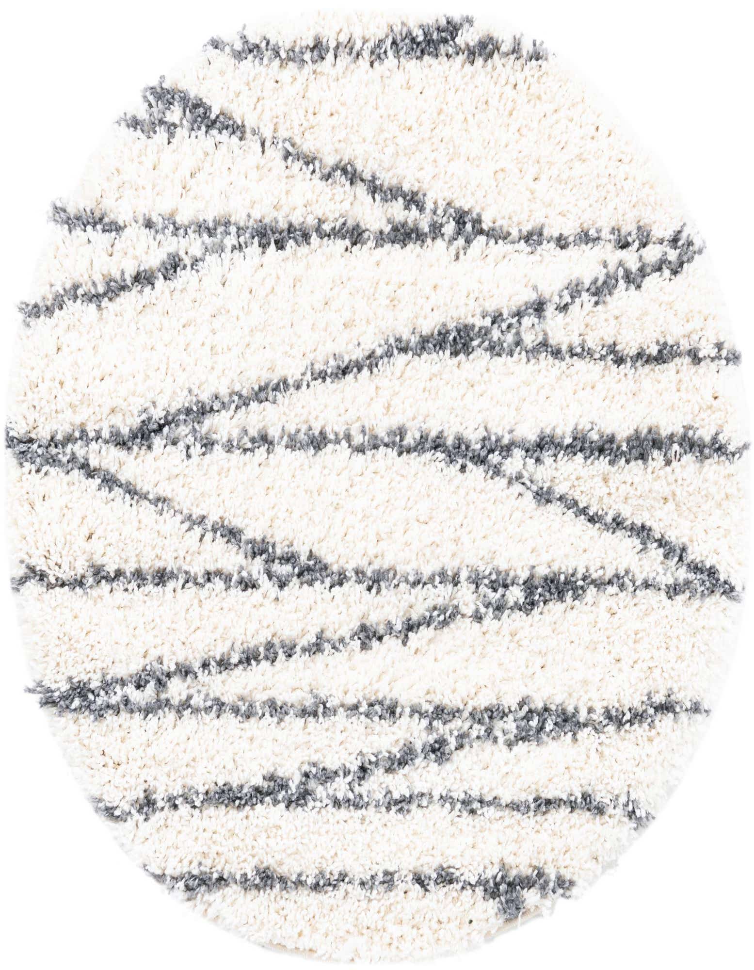 A round white shag rug with textured gray stripe patterns, ideal for adding modern comfort to any indoor space.
