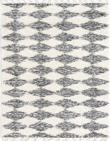 A 12 ft runner rug from the Serenity Shag collection, featuring a modern white and gray trellis pattern with a textured shag pile and white tassels.