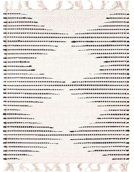 A 1' 2 x 4' 0 white cotton flatweave table runner with irregular black horizontal stripes and fringed ends.