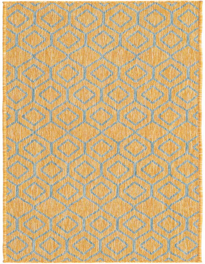 A Jill Zarin Outdoor 8 Ft Runner rug featuring a modern blue trellis pattern on a textured gold and yellow background.