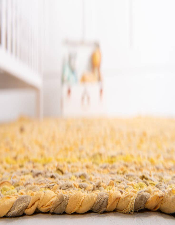 Detail image of  5' 1 x 8'  Hand Braided Chindi Oval Rug