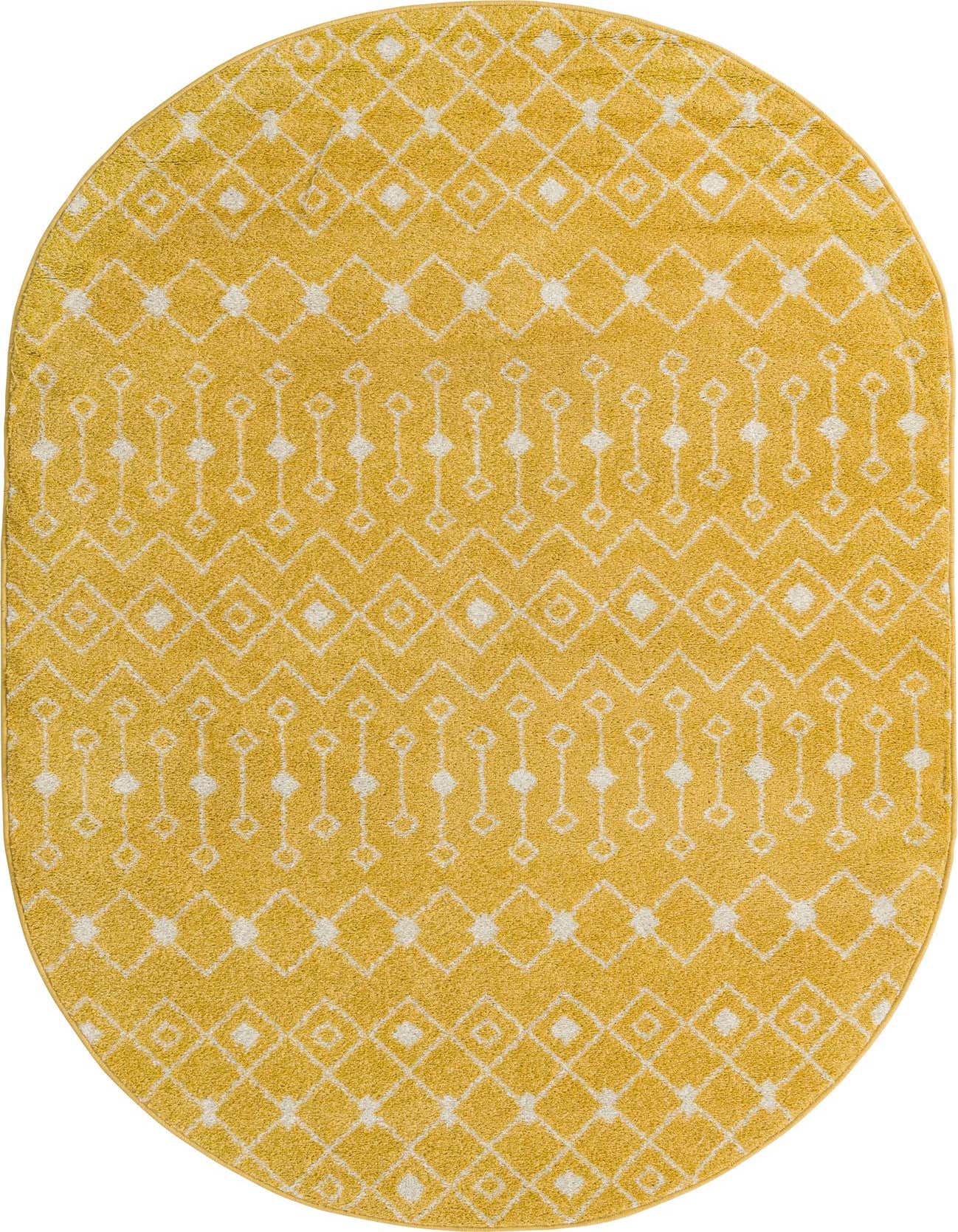 A 5'3 x 8'0 oval yellow area rug with a white bohemian trellis pattern, suitable for indoor spaces.