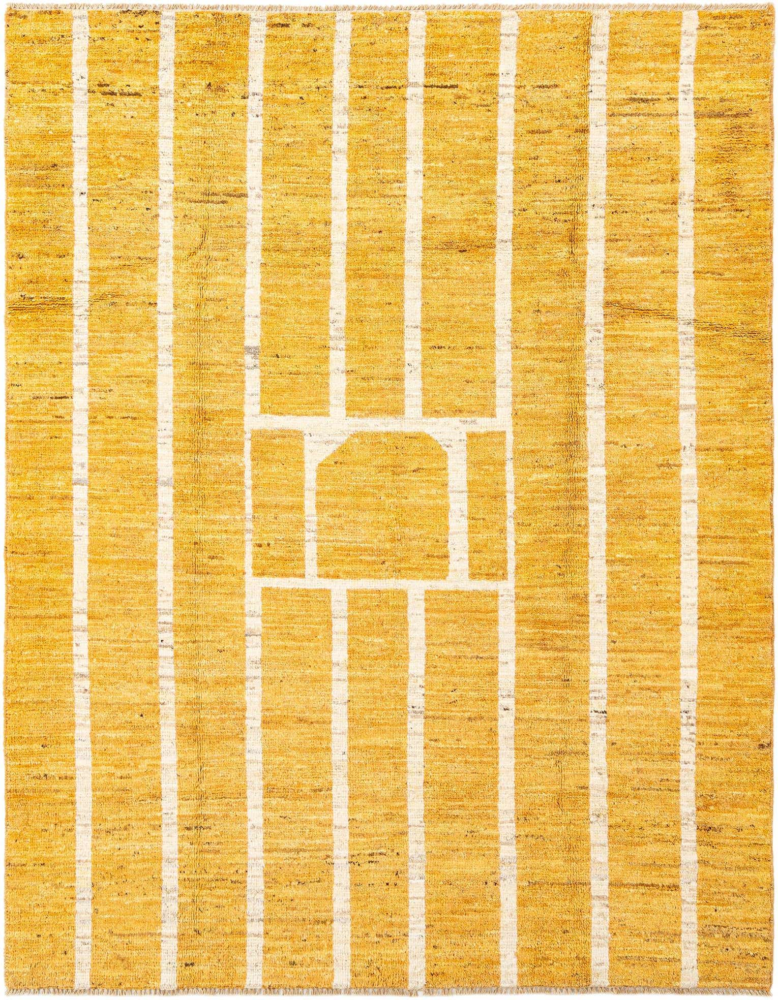 A 5x8 rectangular yellow and gold wool rug with a modern striped pattern and a central abstract design.