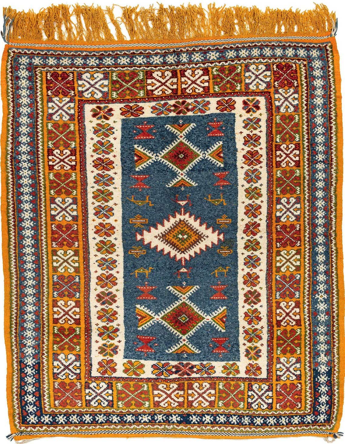 A rectangular 5x8 Berber rug with a central blue panel featuring geometric patterns, surrounded by borders in yellow, gold, red, and white, with fringed ends.