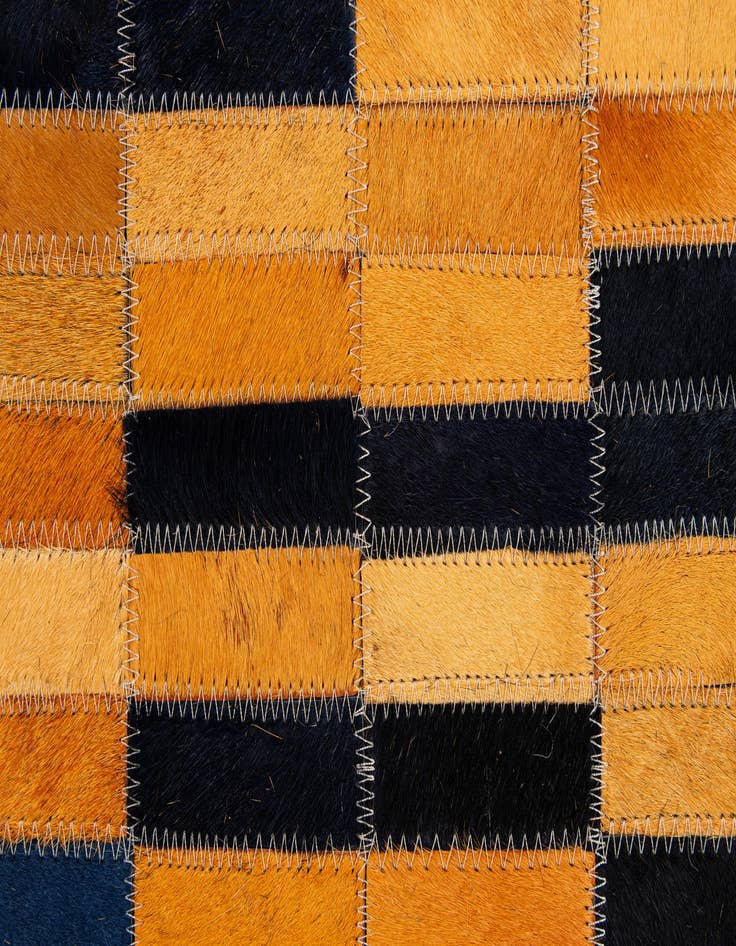 Detail image of  5' 1 x 7' 11 Cowhide - Patchwork Rug